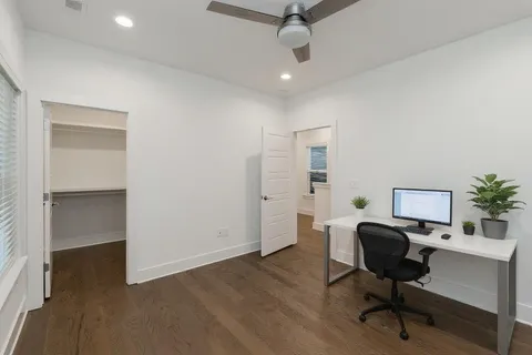 a view of a workspace with furniture