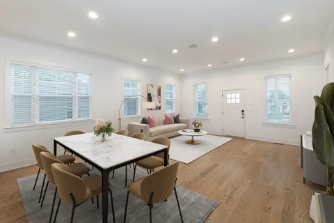 a view of a dining room with furniture