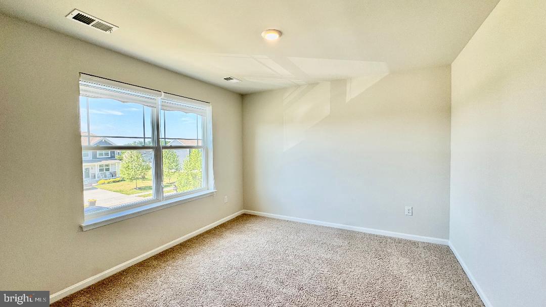 1236 Pimpernell Path Middletown, DE 19709 - Photo 29 of 37 an empty room with a window