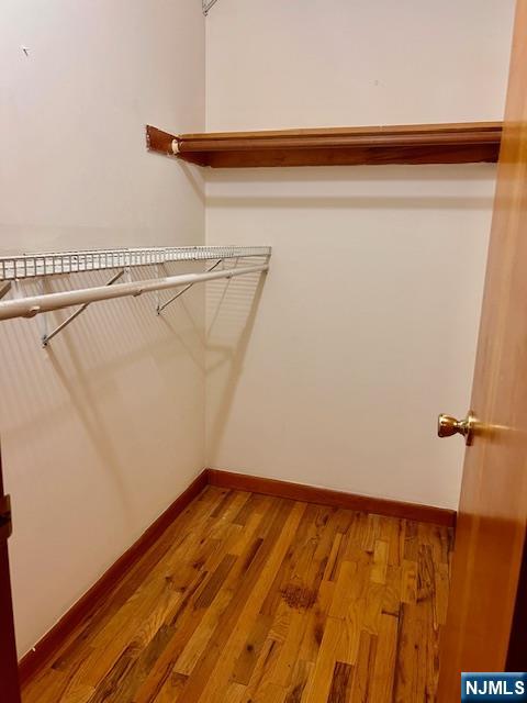225 6th Street, Unit 2 Fairview, NJ 07022 - Photo 11 of 14 a view of a room with wooden floor