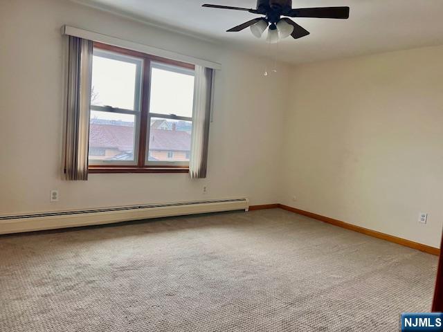 225 6th Street, Unit 2 Fairview, NJ 07022 - Photo 12 of 14 an empty room with a window