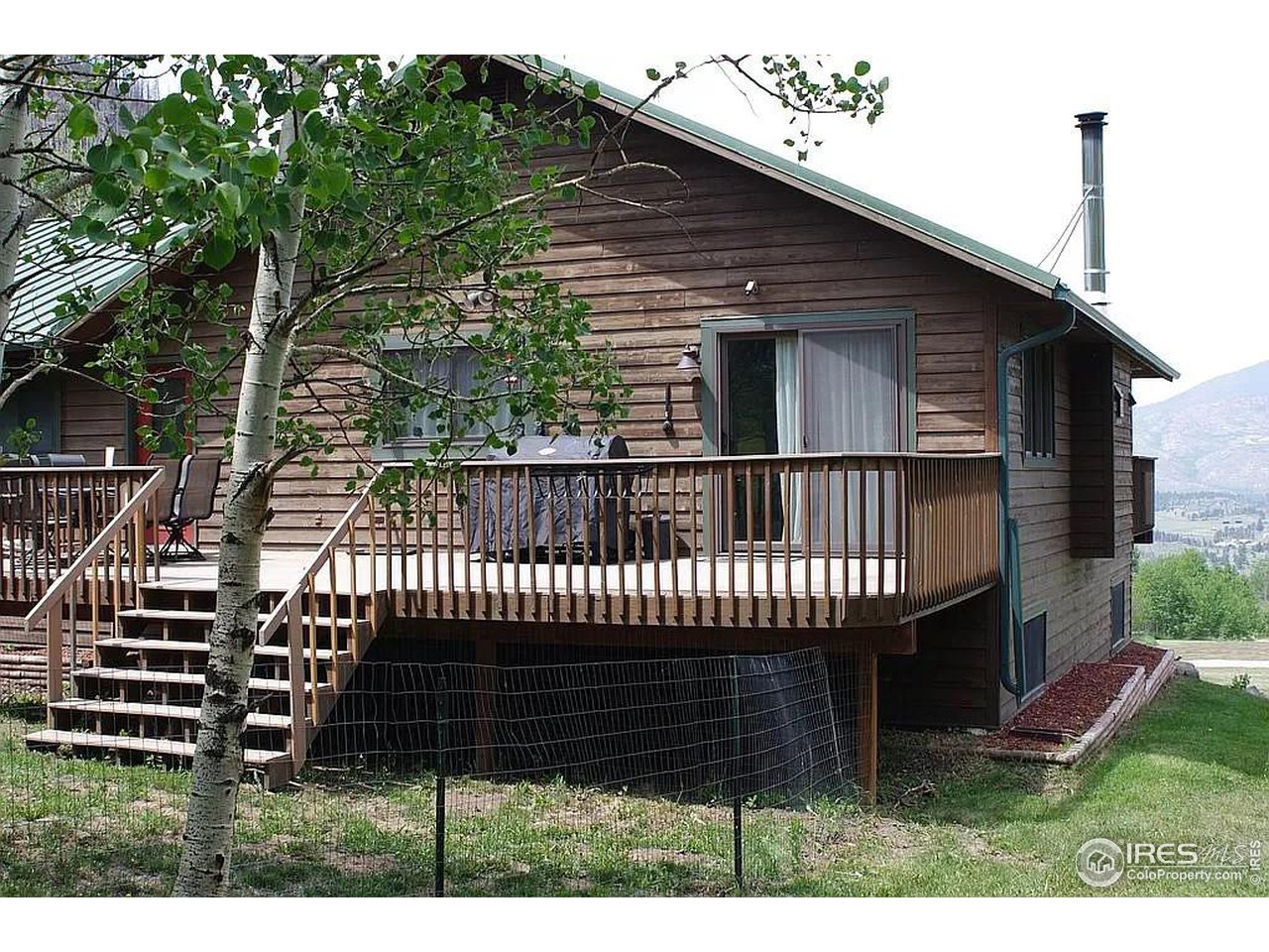 16705 Rist Canyon Road Bellvue, CO 80512 - Photo 6 of 25 a view of a house with a deck