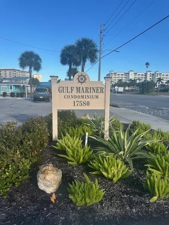 a sign that is on the side of the road