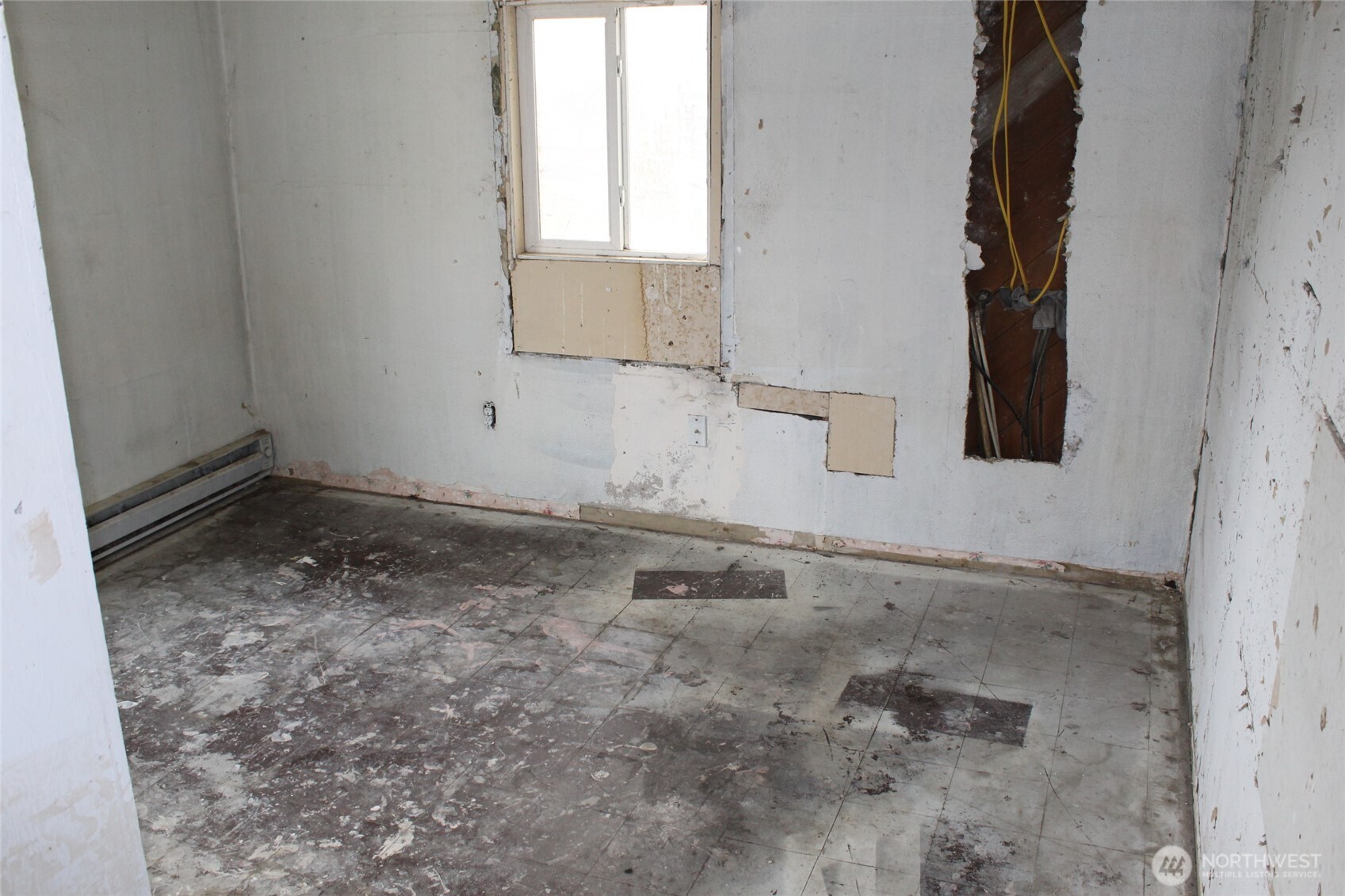 113 Lutcher Avenue Lind, WA 99341 - Photo 12 of 13 a view of a room that has a window in it