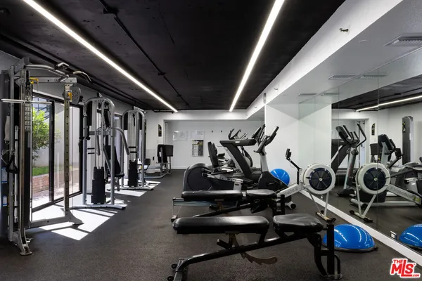 a view of a room with gym equipment