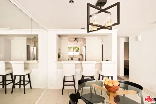 a view of kitchen with breakfast area