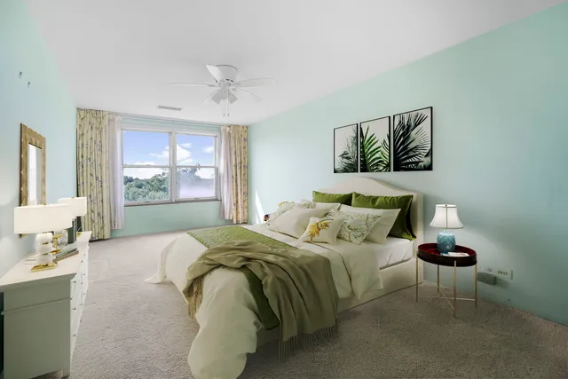 a bedroom with a bed and window