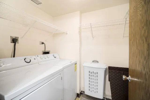 a utility room with dryer and washer