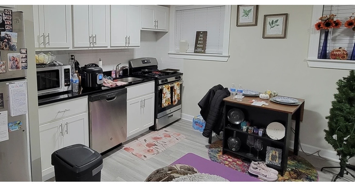 732 West Roscoe Street, Unit NGD Chicago, IL 60657 - Photo 3 of 8 a kitchen with cabinets and appliances