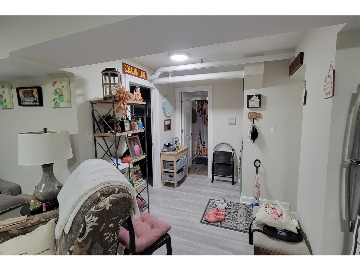 732 West Roscoe Street, Unit NGD Chicago, IL 60657 - Photo 5 of 8 a bedroom with a bed and wooden floor