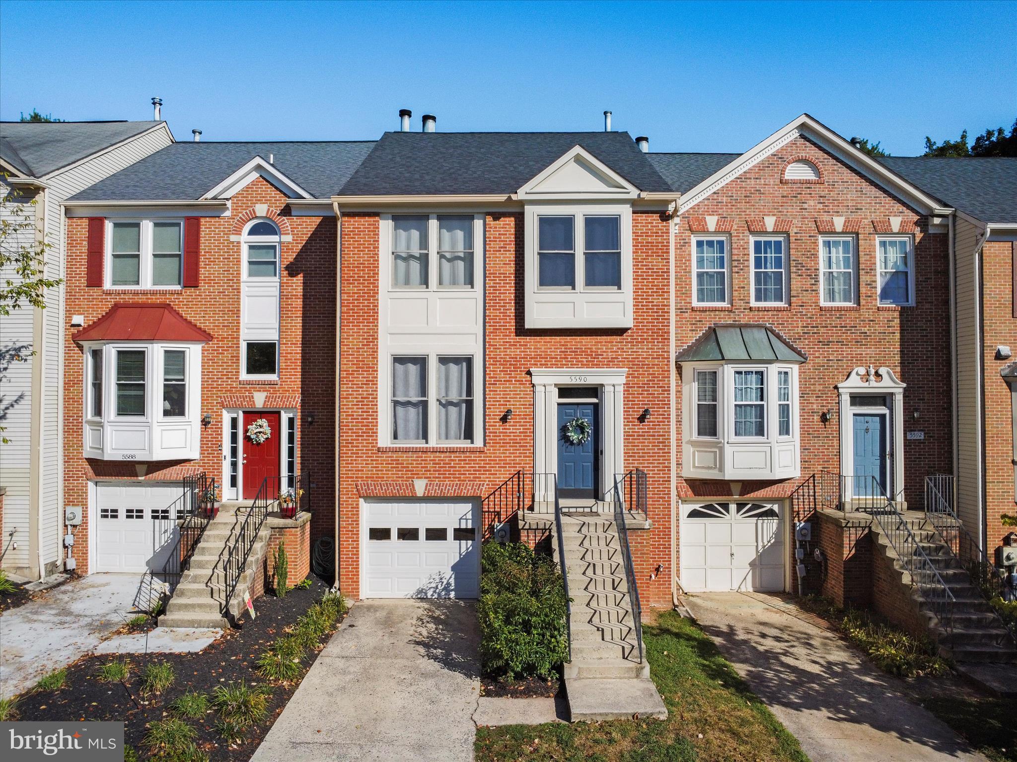 5590 Rivendell Place Frederick, MD 21703 - Photo 1 of 1 a front view of a house with a yard