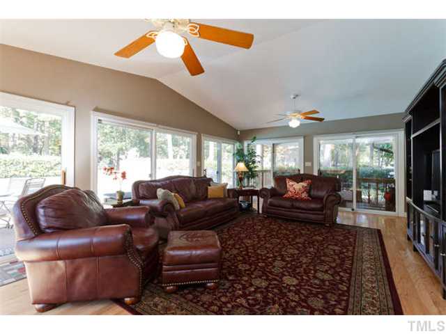 1605 Su John Road Raleigh, NC 27607 - Photo 18 of 25 a living room with furniture and a large window