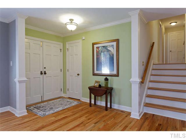 1605 Su John Road Raleigh, NC 27607 - Photo 3 of 25 a view of an entryway with wooden floor