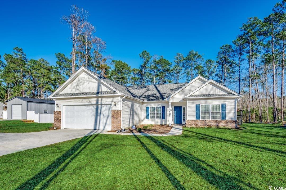 477 Cane Branch Road Loris, SC 29569 - Photo 1 of 27 View of front of home featuring a garage and a fro