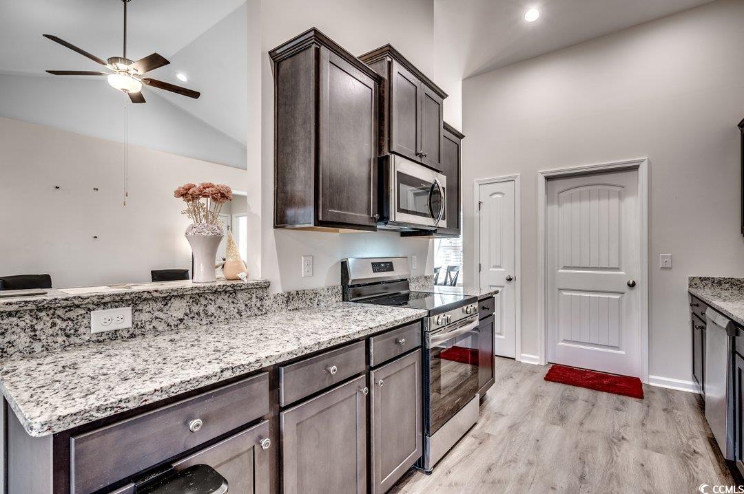 477 Cane Branch Road Loris, SC 29569 - Photo 11 of 27 Kitchen with stainless steel appliances, light sto