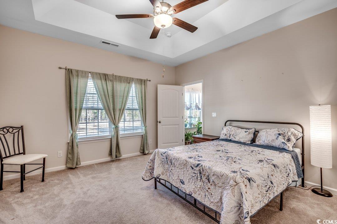477 Cane Branch Road Loris, SC 29569 - Photo 15 of 27 Carpeted bedroom featuring ceiling fan and a tray