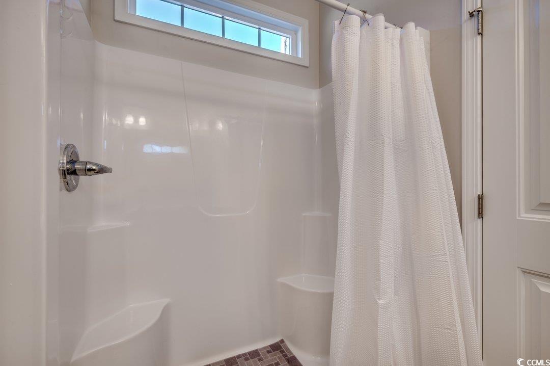 477 Cane Branch Road Loris, SC 29569 - Photo 19 of 27 Bathroom featuring walk in shower