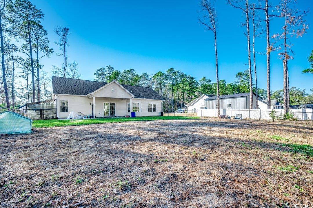 477 Cane Branch Road Loris, SC 29569 - Photo 2 of 27 Back of property with a yard