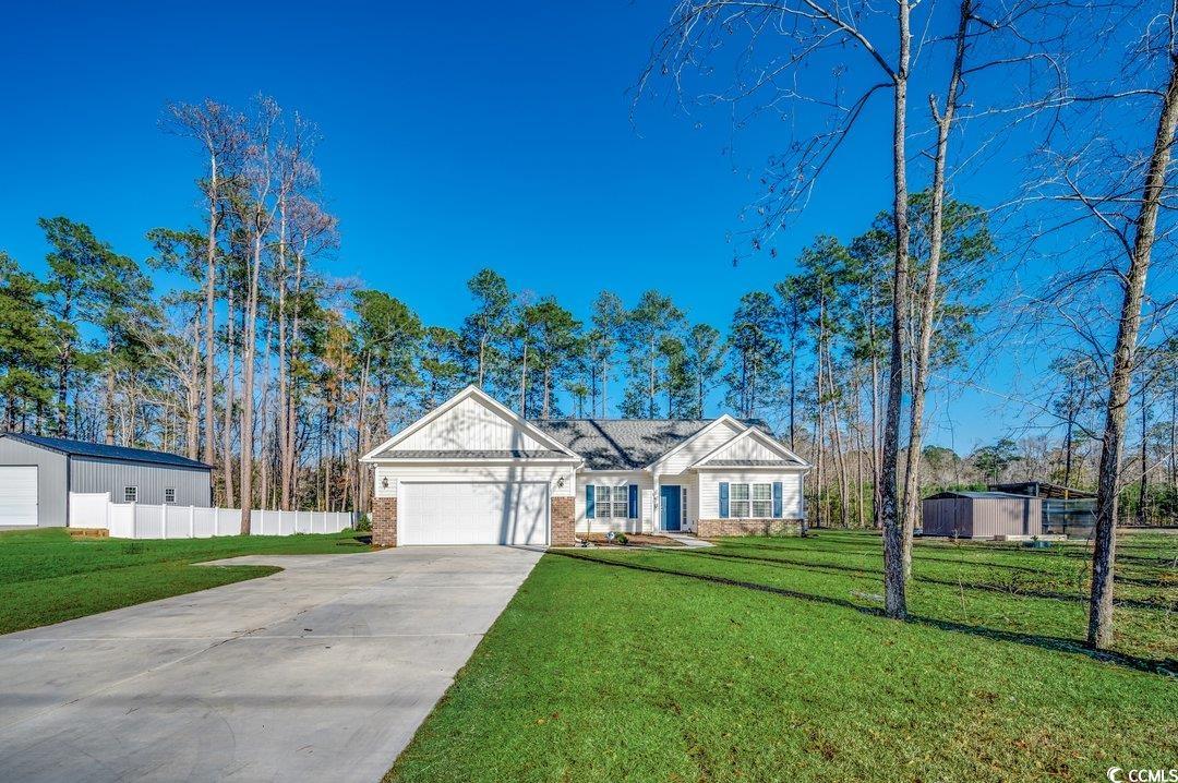 477 Cane Branch Road Loris, SC 29569 - Photo 25 of 27 Ranch-style home featuring a garage and a front la