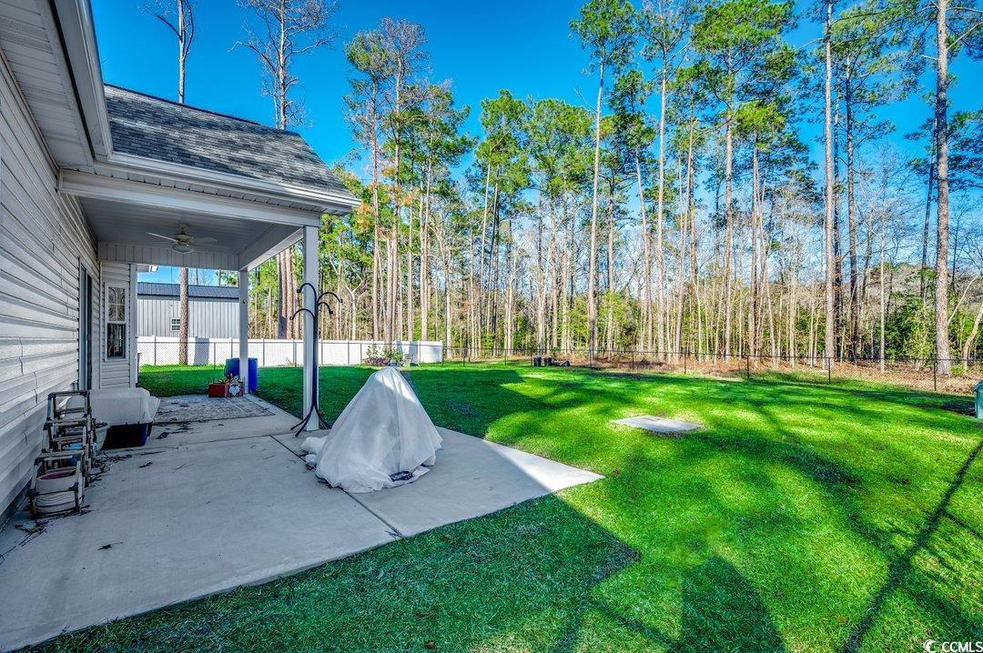 477 Cane Branch Road Loris, SC 29569 - Photo 3 of 27 View of yard with ceiling fan