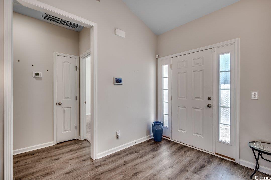 477 Cane Branch Road Loris, SC 29569 - Photo 4 of 27 Foyer entrance featuring lofted ceiling and wood-t