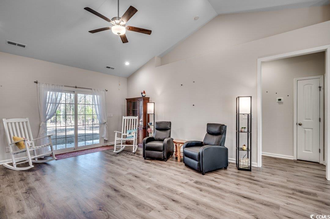 477 Cane Branch Road Loris, SC 29569 - Photo 6 of 27 Living area featuring ceiling fan, high vaulted ce