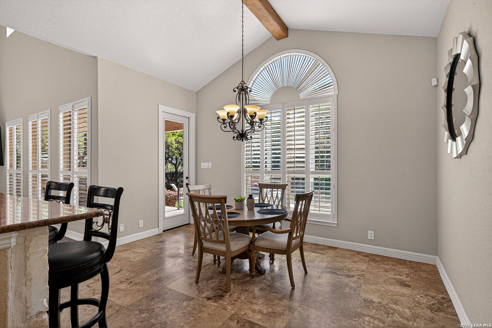 24511 Bogey Ridge San Antonio, TX 78258 - Photo 11 of 39 a view of a dining room with furniture window and outside view
