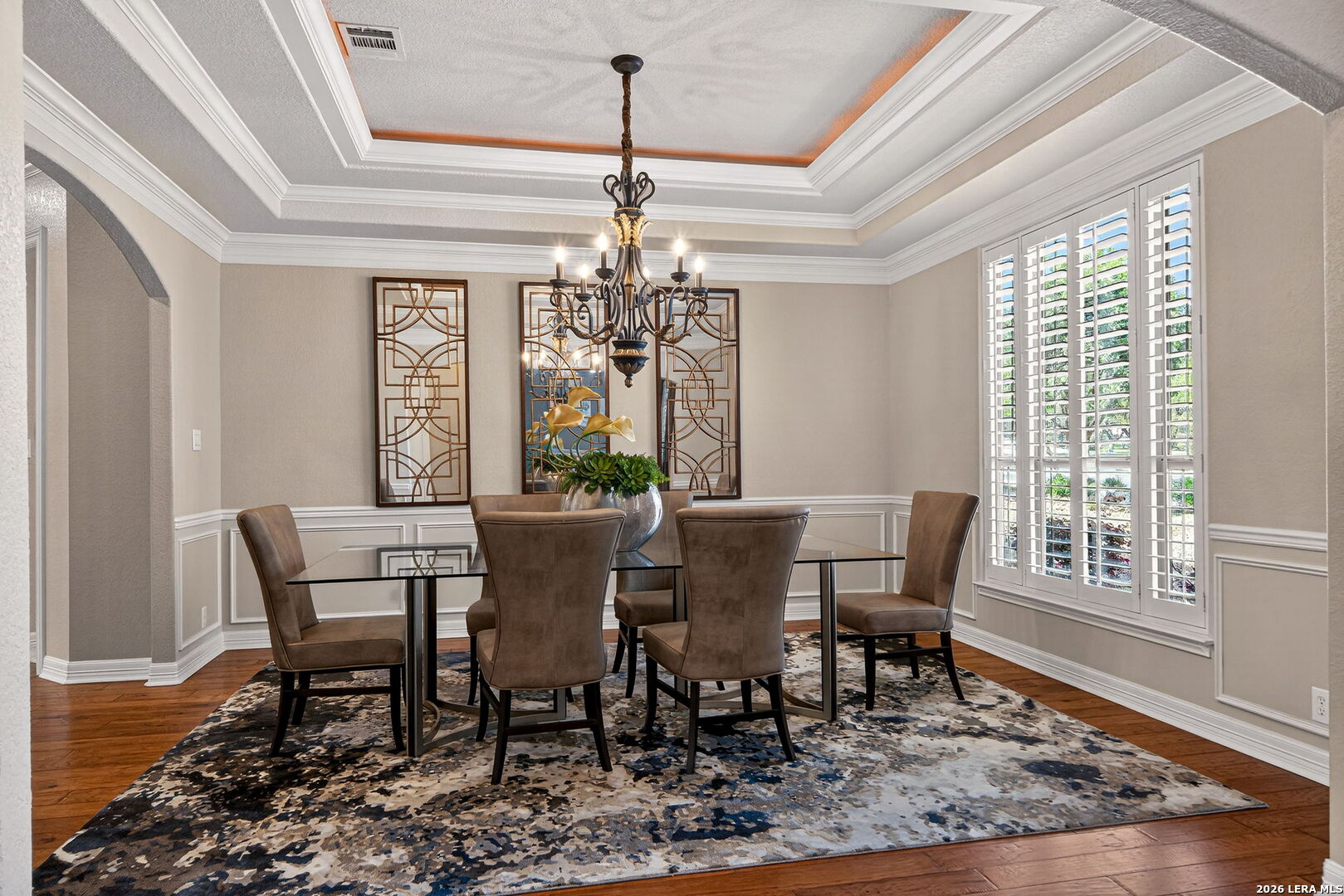 24511 Bogey Ridge San Antonio, TX 78258 - Photo 14 of 39 a view of a dining room with furniture window and wooden floor