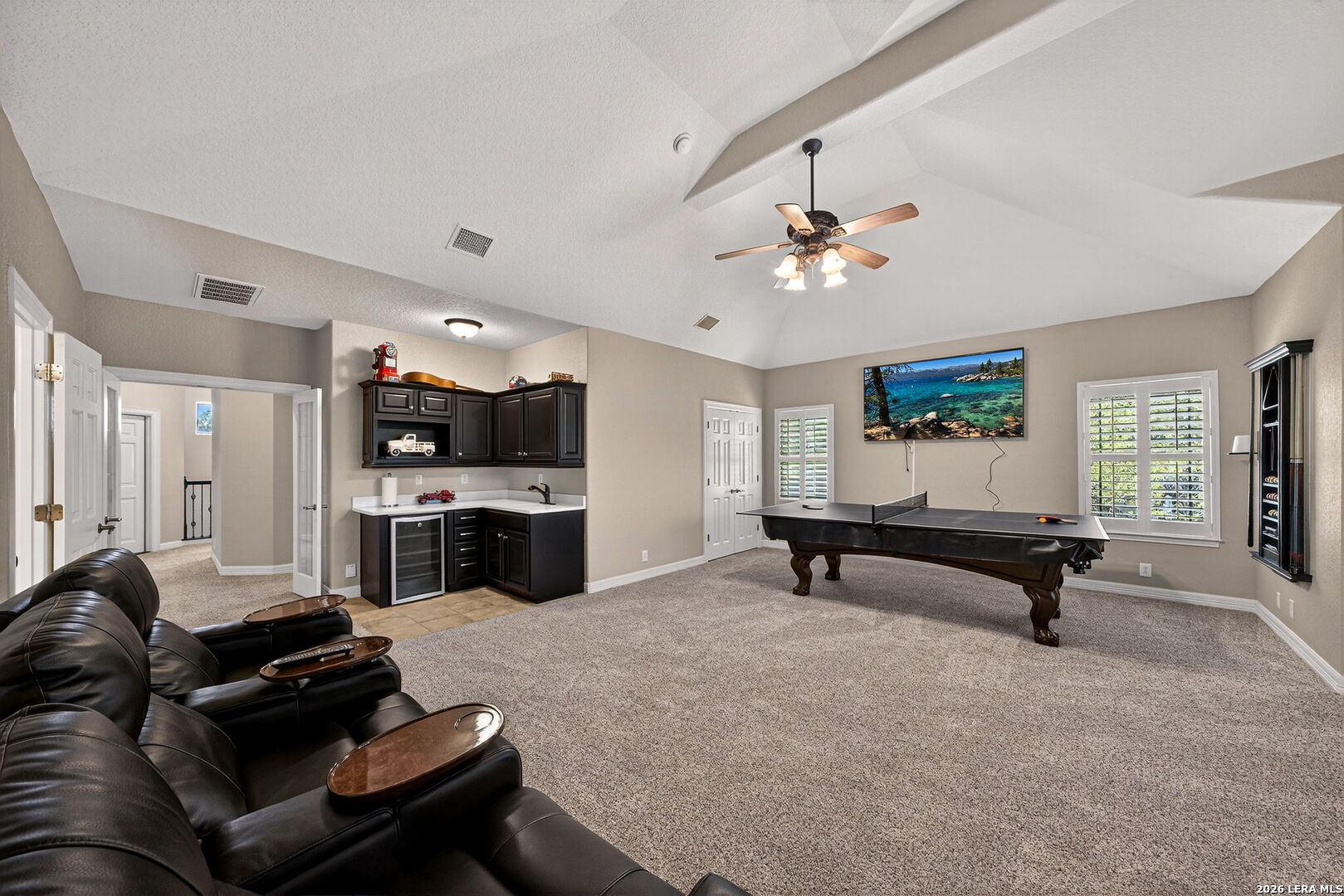 24511 Bogey Ridge San Antonio, TX 78258 - Photo 31 of 39 a living room with furniture and kitchen view