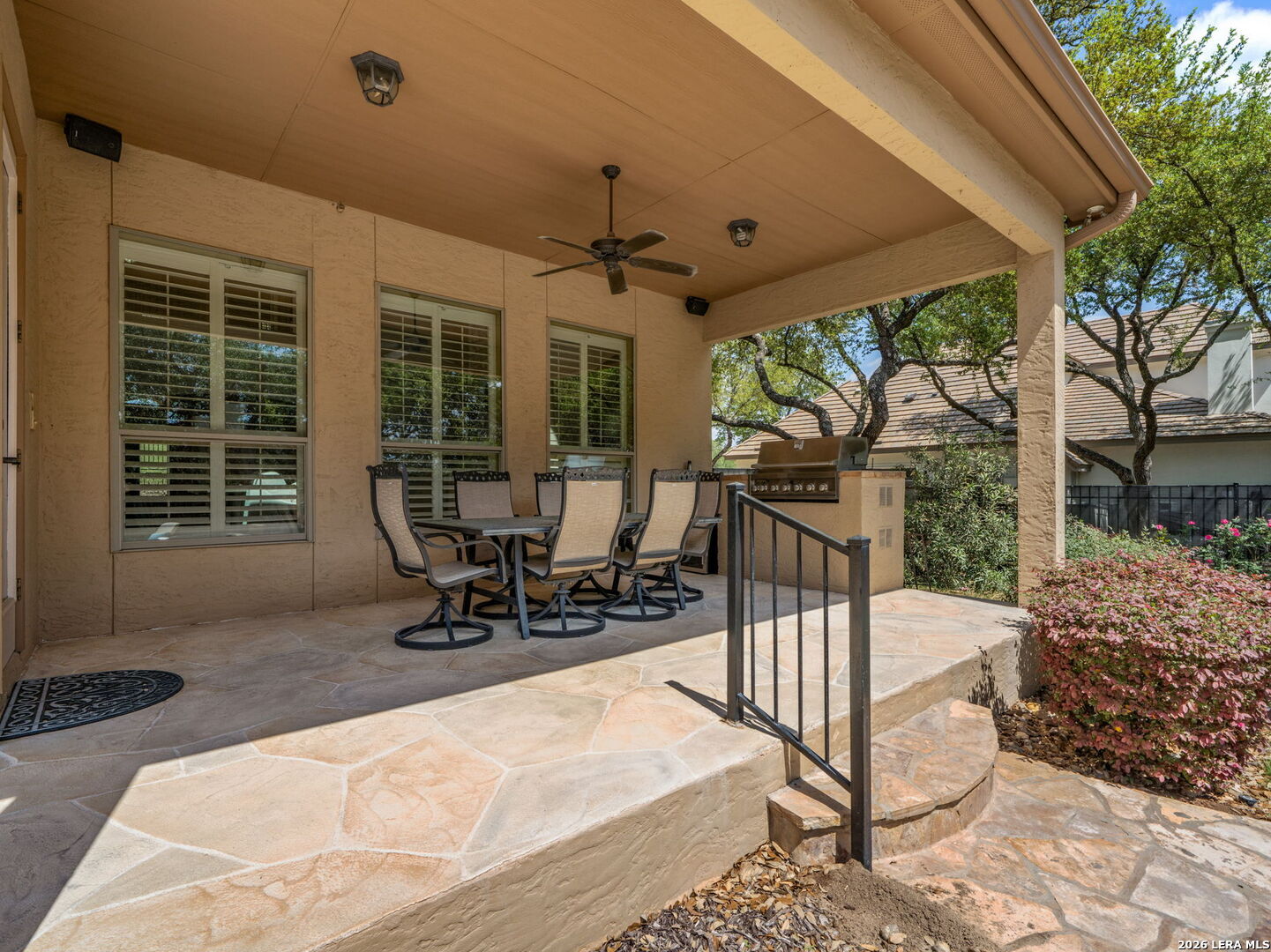 24511 Bogey Ridge San Antonio, TX 78258 - Photo 32 of 39 a building outdoor space with patio furniture and potted plants