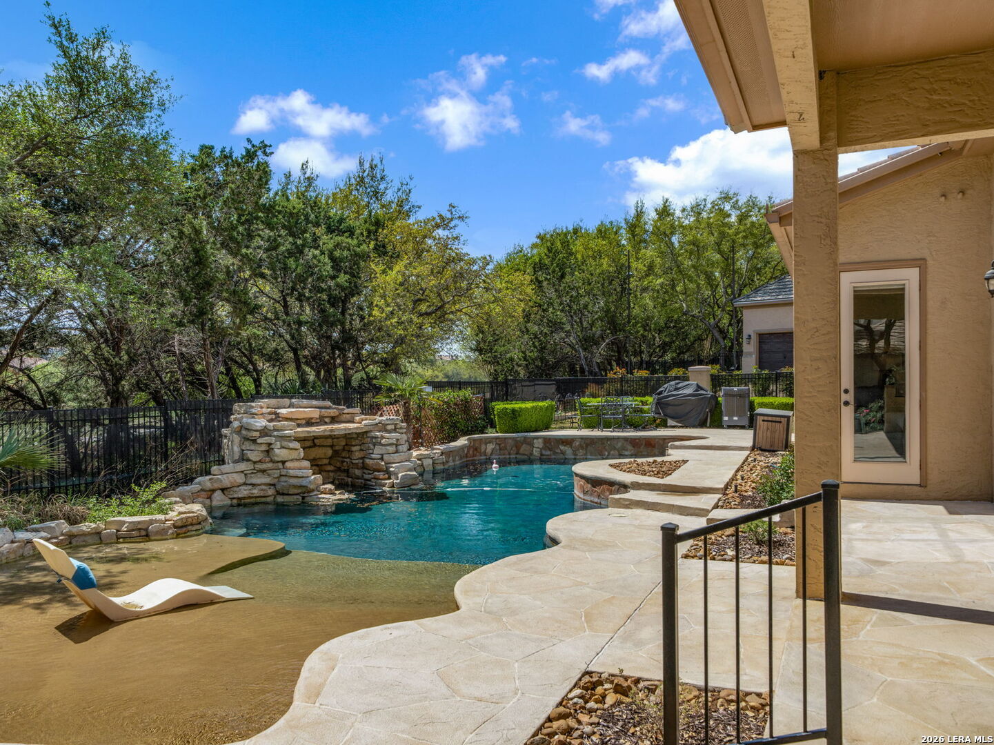 24511 Bogey Ridge San Antonio, TX 78258 - Photo 33 of 39 a view of a swimming pool with a patio