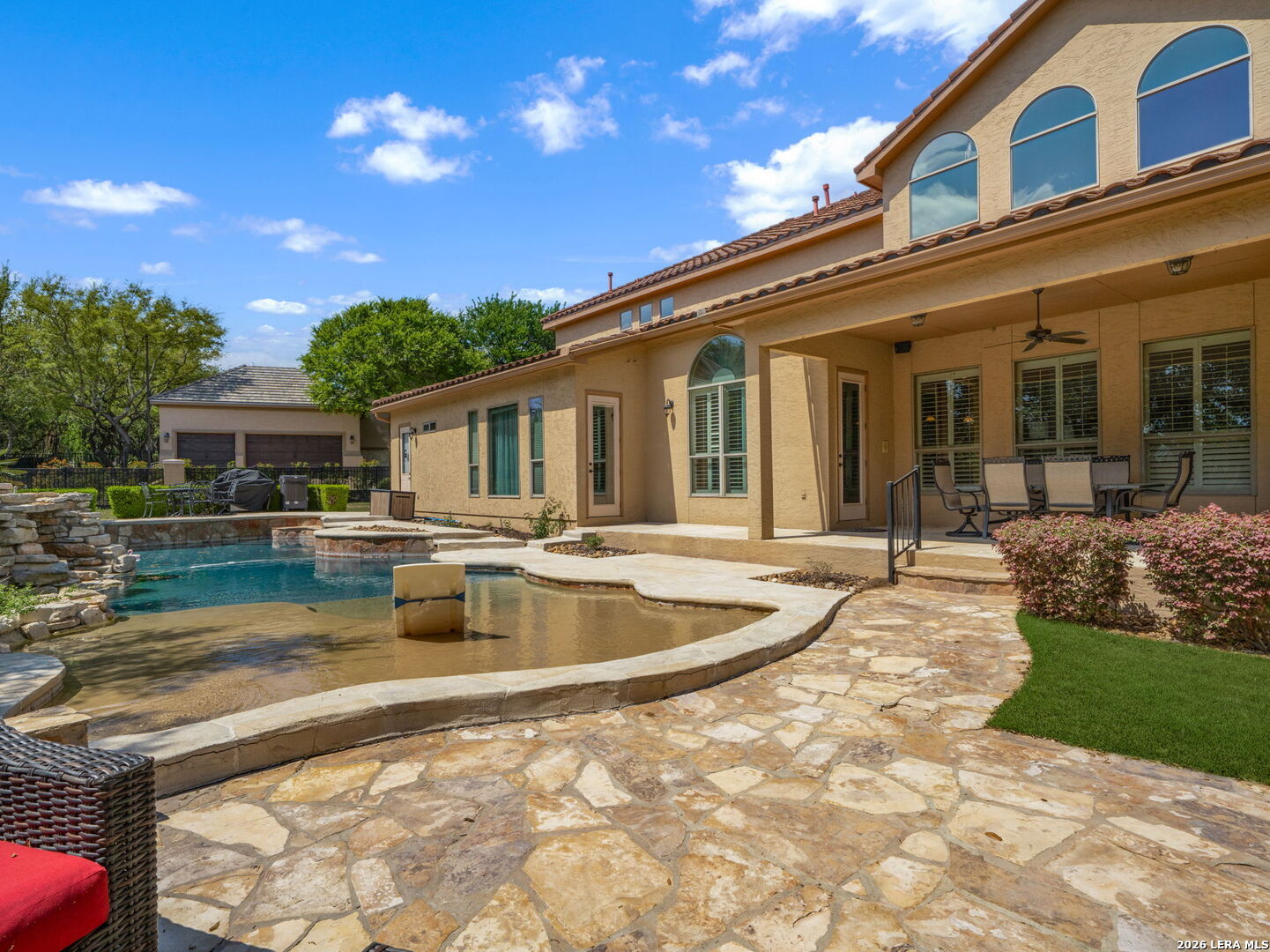 24511 Bogey Ridge San Antonio, TX 78258 - Photo 34 of 39 a view of a house with swimming pool and sitting area