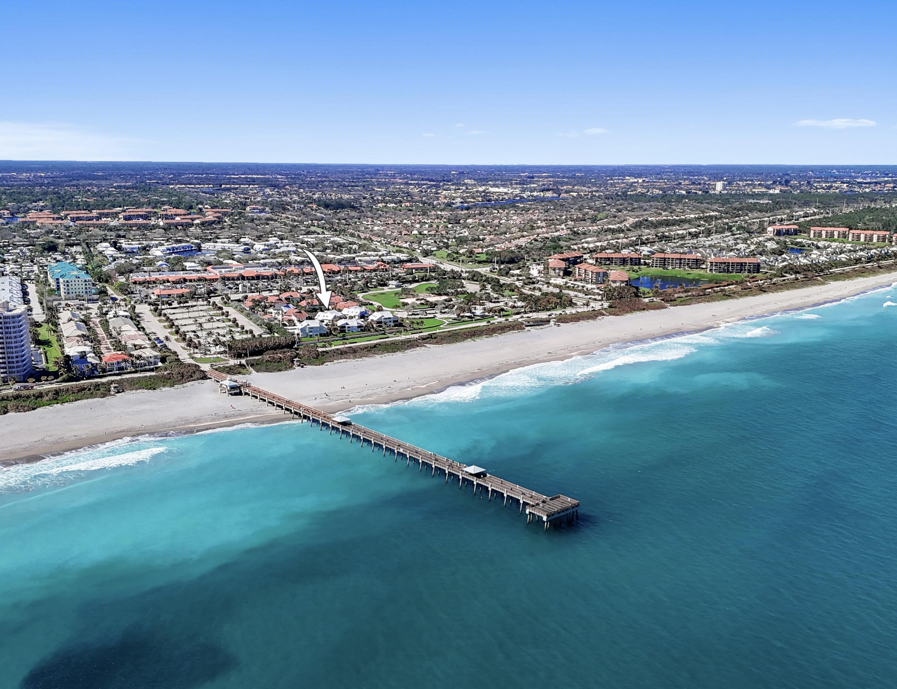 4161 U.S. Highway 1, Unit I2 Jupiter, FL 33477 - Photo 1 of 64 an aerial view of a house with a garden
