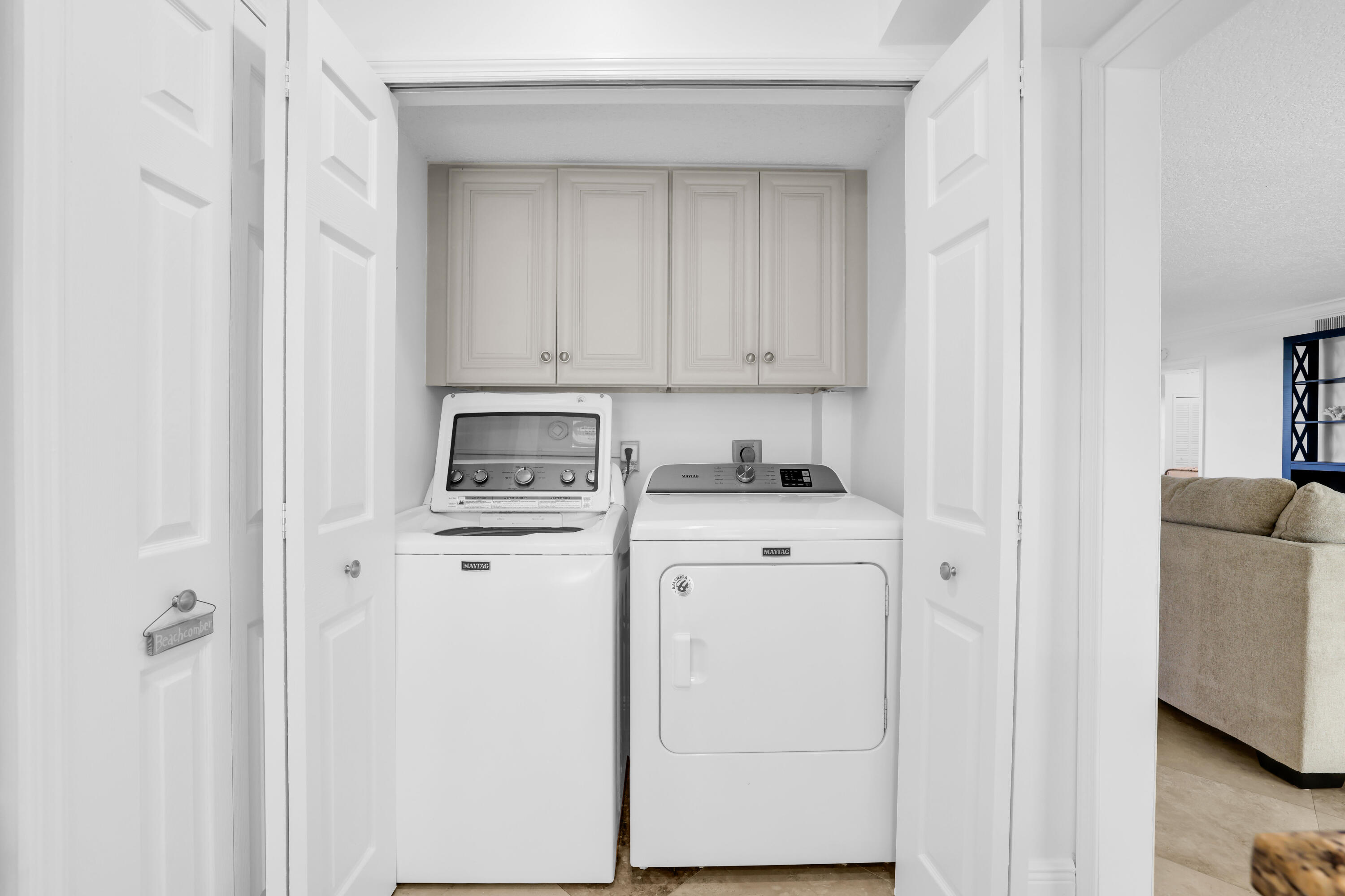 4161 U.S. Highway 1, Unit I2 Jupiter, FL 33477 - Photo 35 of 64 a view of storage and utility room with washer and dryer