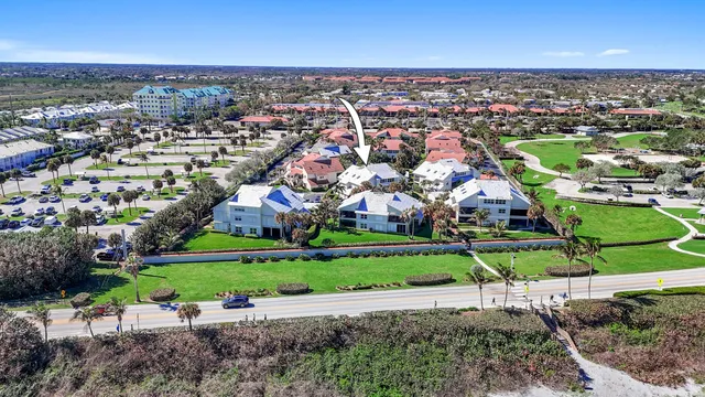an aerial view of a house with a garden