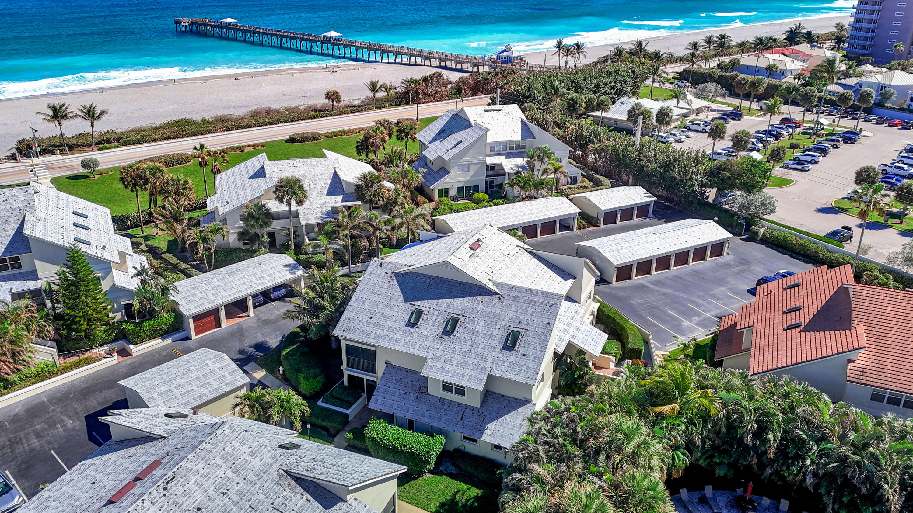 4161 U.S. Highway 1, Unit I2 Jupiter, FL 33477 - Photo 45 of 64 an aerial view of a house with a garden