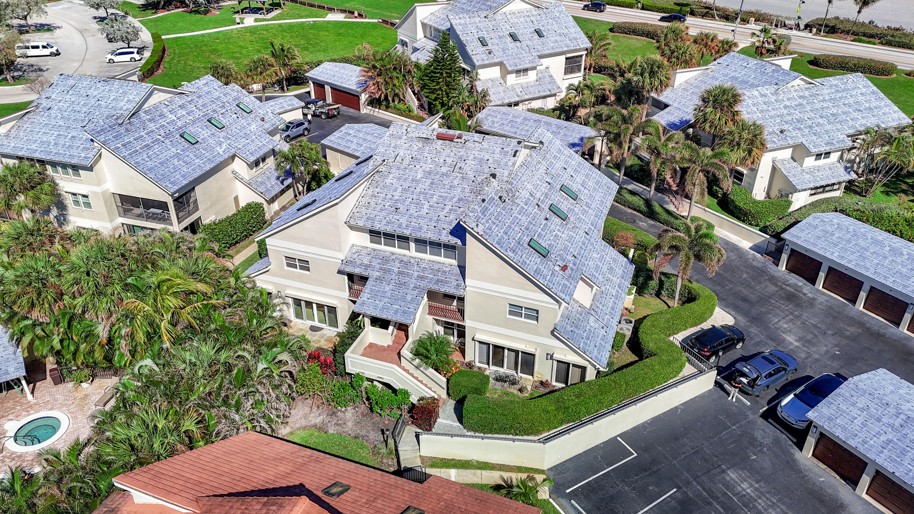4161 U.S. Highway 1, Unit I2 Jupiter, FL 33477 - Photo 50 of 64 an aerial view of multiple houses with yard