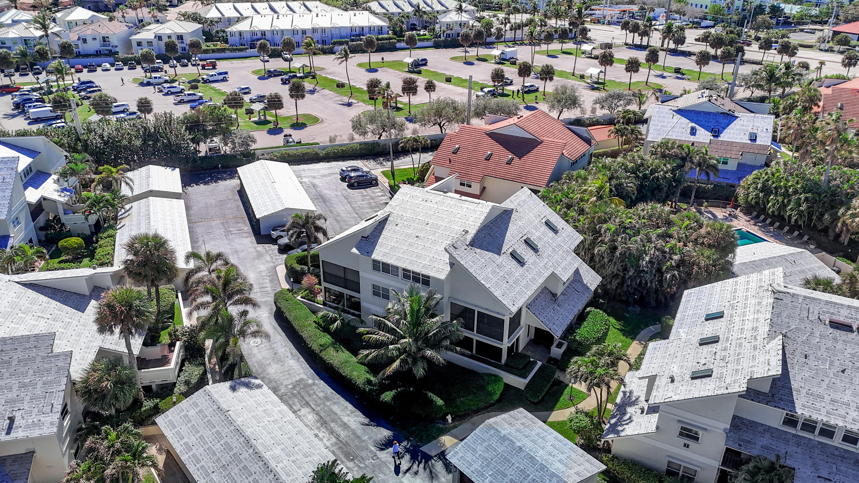 4161 U.S. Highway 1, Unit I2 Jupiter, FL 33477 - Photo 55 of 64 an aerial view of multiple houses with yard