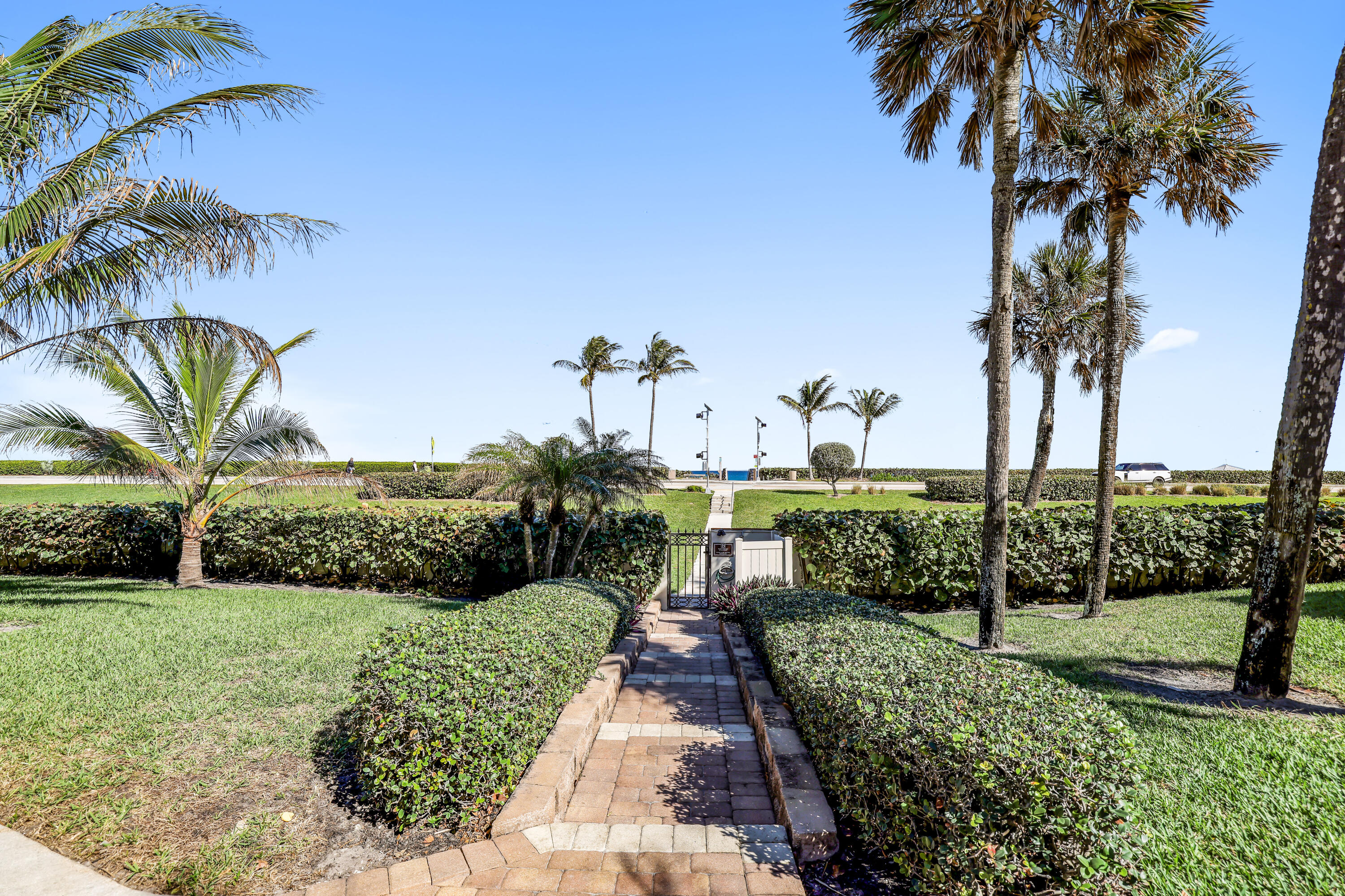 4161 U.S. Highway 1, Unit I2 Jupiter, FL 33477 - Photo 63 of 64 a view of a garden with palm trees