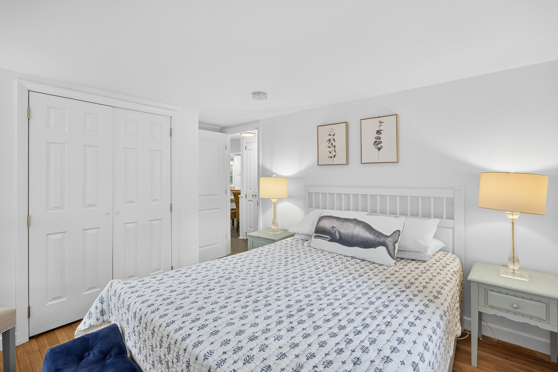 53 Main Street Sandwich, MA 02563 - Photo 11 of 33 a bedroom with a bed and a lamp