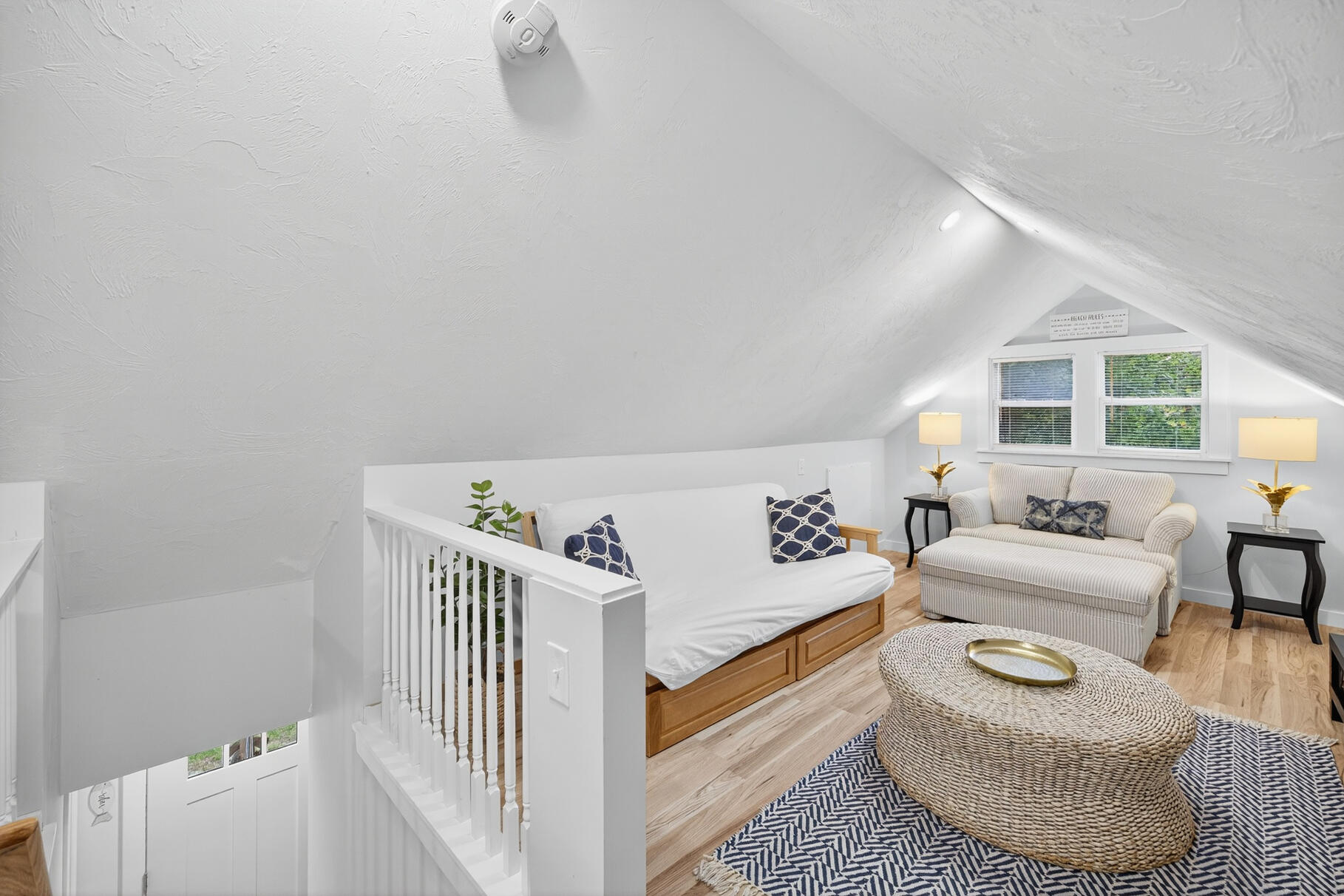 53 Main Street Sandwich, MA 02563 - Photo 16 of 33 a bedroom with furniture and a window