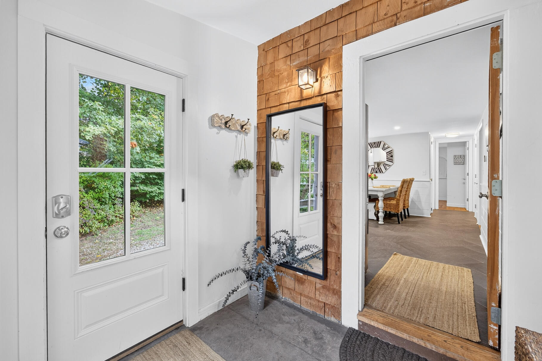 53 Main Street Sandwich, MA 02563 - Photo 23 of 33 a view of a livingroom with furniture and front door