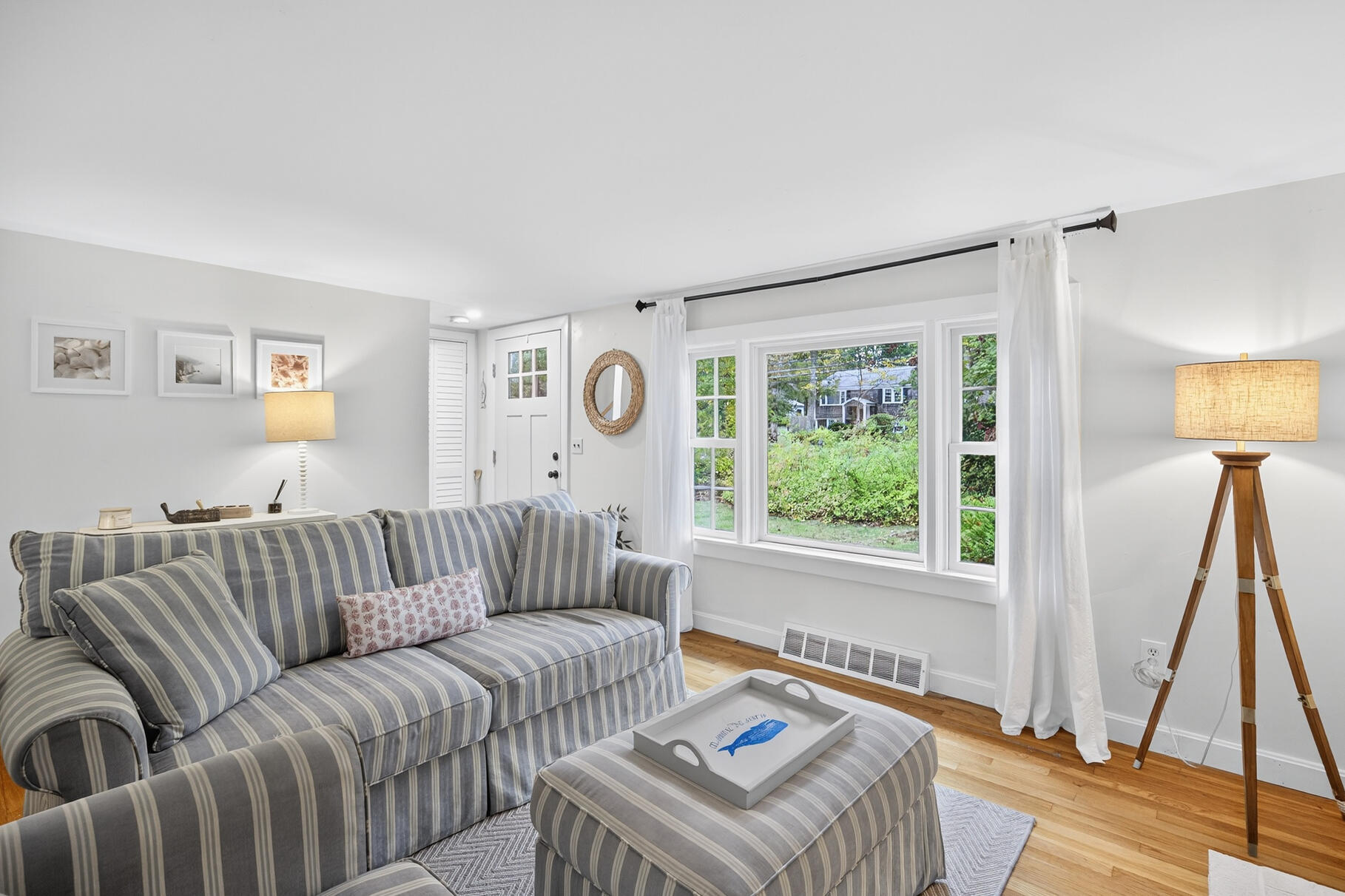 53 Main Street Sandwich, MA 02563 - Photo 3 of 33 a living room with furniture and a window