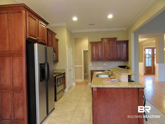 32122 Weatherly Cove Daphne, AL 36527 - Photo 10 of 26 Kitchen has Stainless Appliances and Pantry