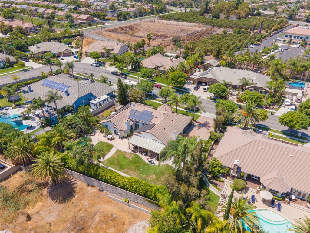 2885 Citrocado Ranch Street Corona, CA 92881 - Photo 43 of 51 an aerial view of residential houses with outdoor space