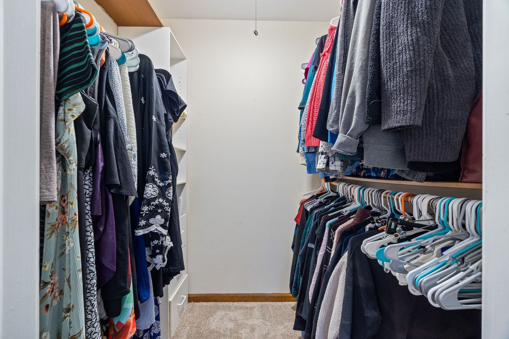 425 North Alfred Avenue Elgin, IL 60123 - Photo 13 of 33 a view of walk in closet with clothes