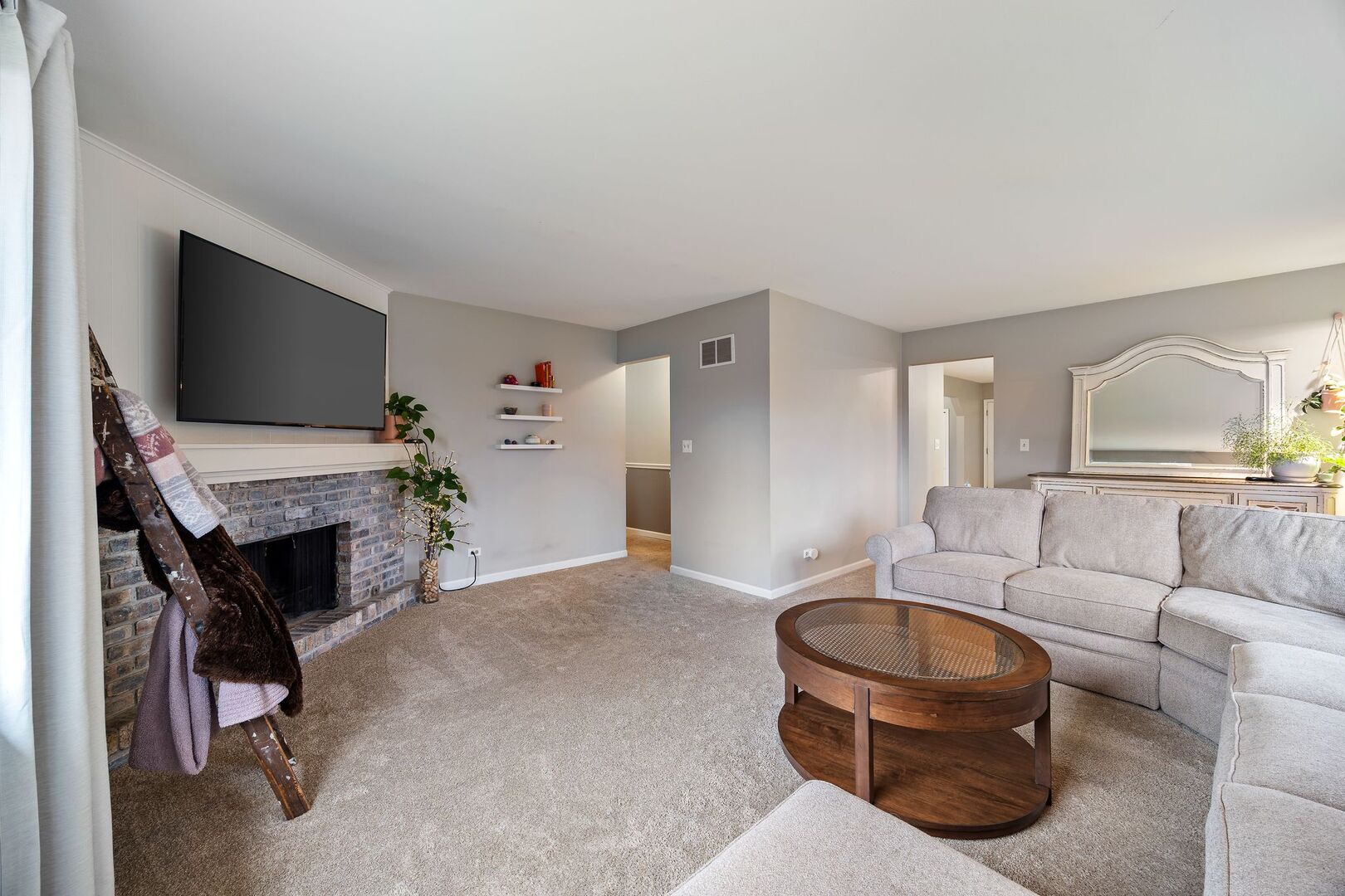 425 North Alfred Avenue Elgin, IL 60123 - Photo 5 of 33 a living room with furniture and a flat screen tv