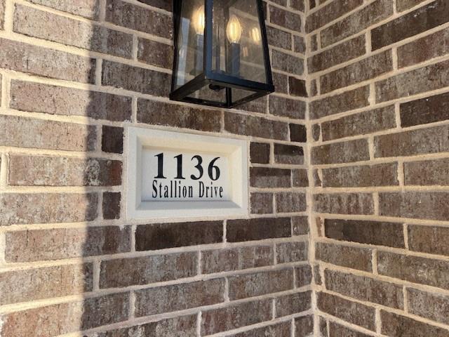 1136 Stallion Drive Plano, TX 75075 - Photo 1 of 1 a view of a door with a street