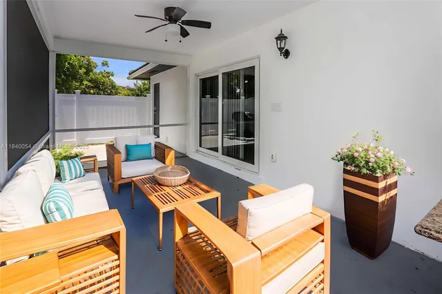 a work room with furniture and a window