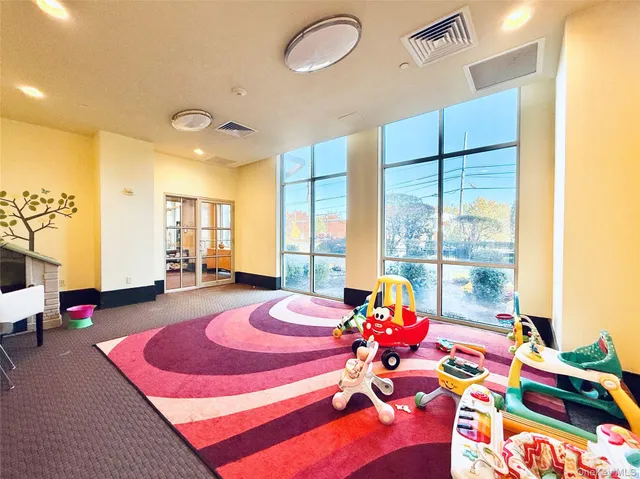 a view of a street with cars